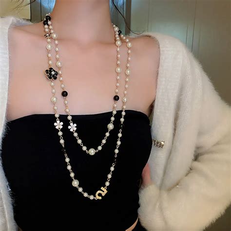 chanel brooch pin dupe|Chanel knockoff pearl necklace.